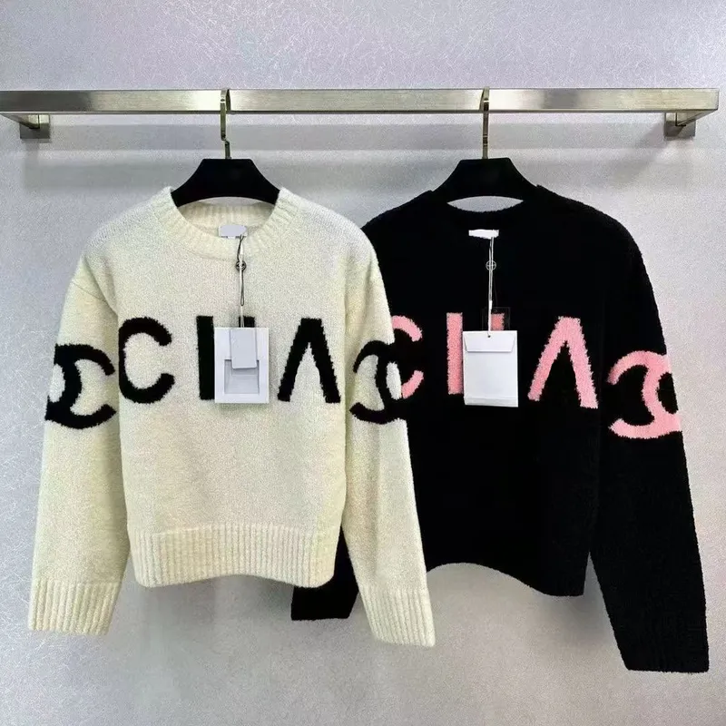 Primavera y otoño Nuevo suéter de manga larga Jacquard suéter de cuello redondo de letras sueltas para hombres y mujeres que los