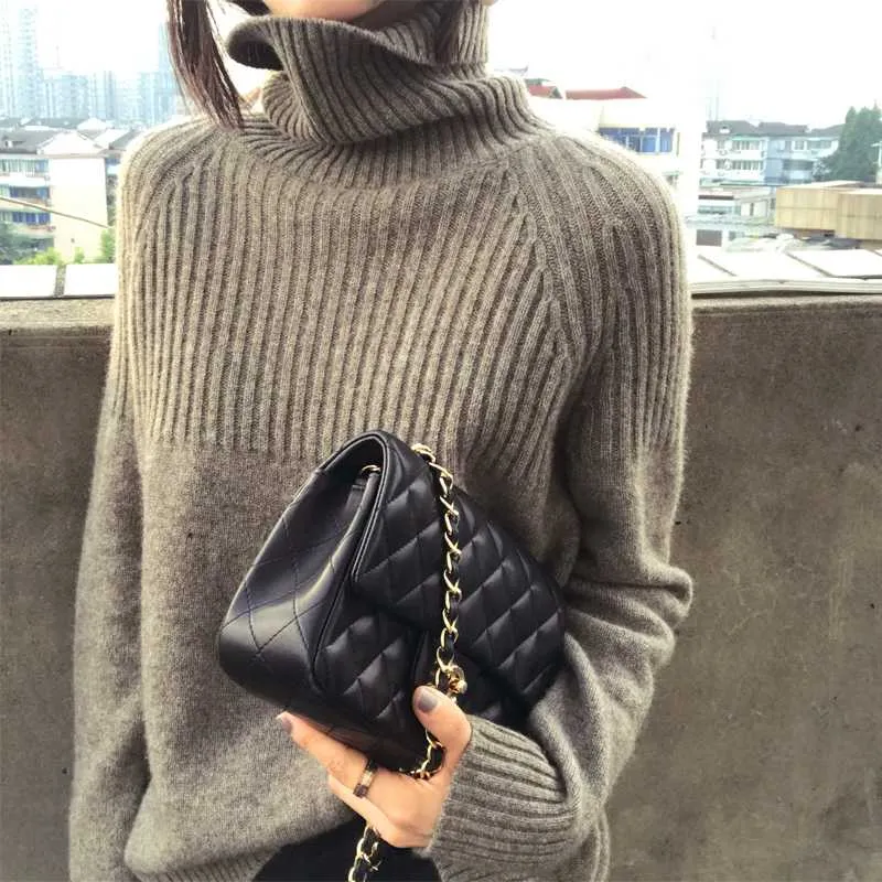 Suéter de mujer nueva primavera de alta calidad de cuello alto de manga larga suéter de Cachemira suave moda femenina suéter de 
